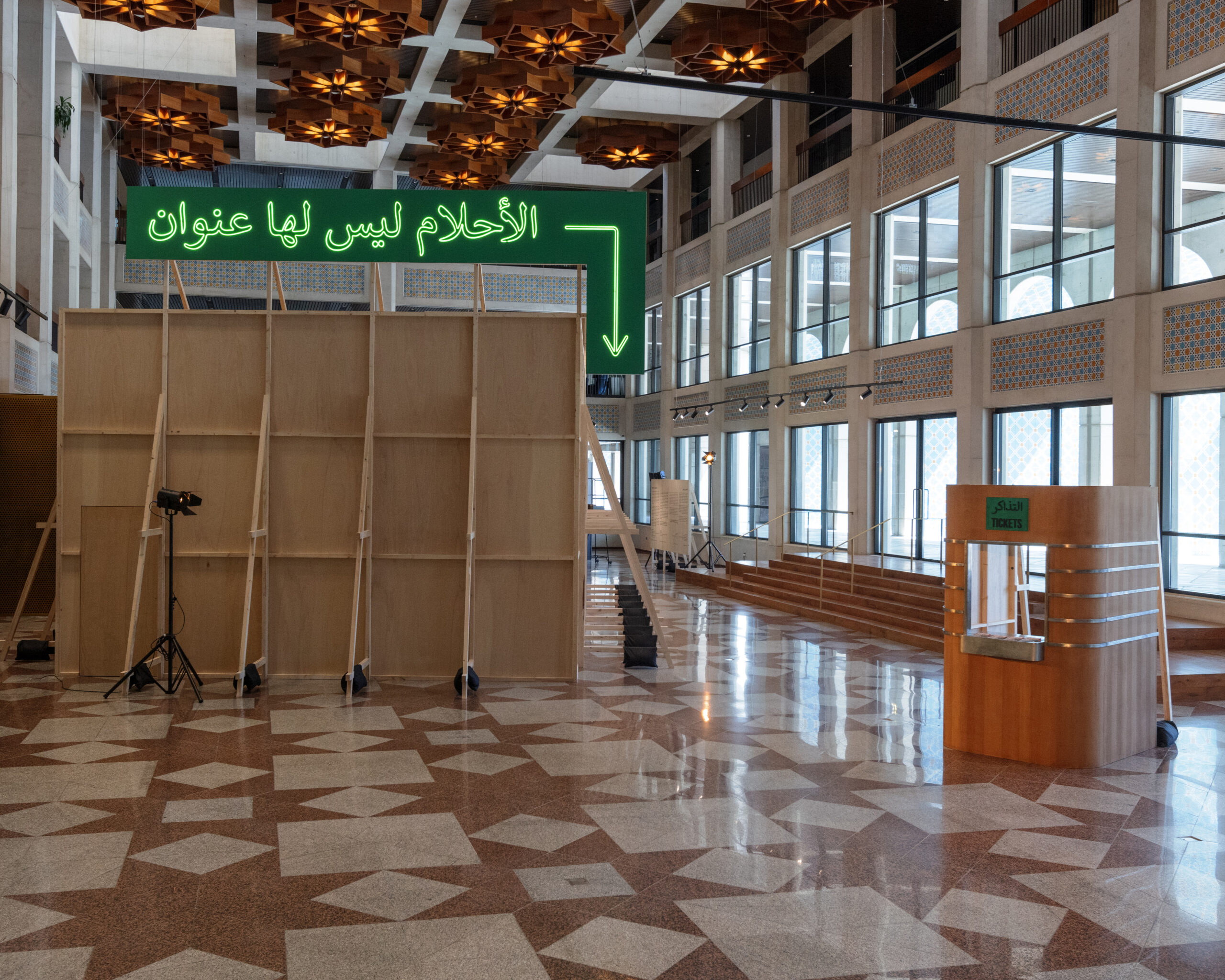 wooden structure cinema with lit green light