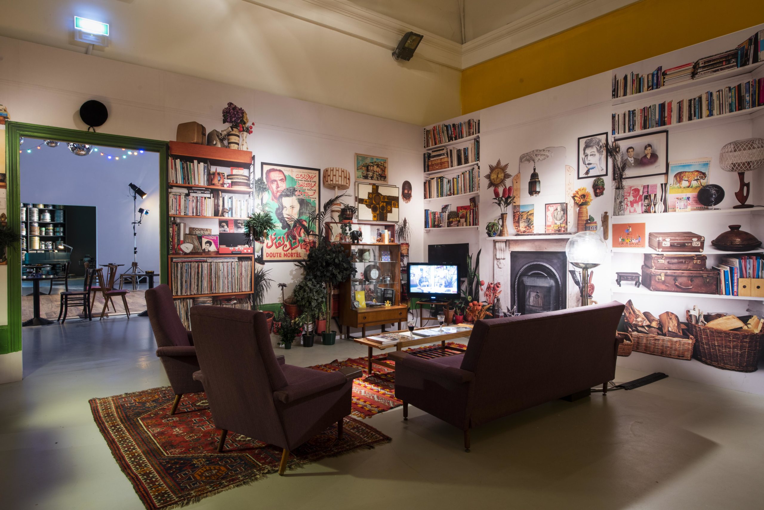 living room style film set with shelves full of objects represented by photorealistic wall paper